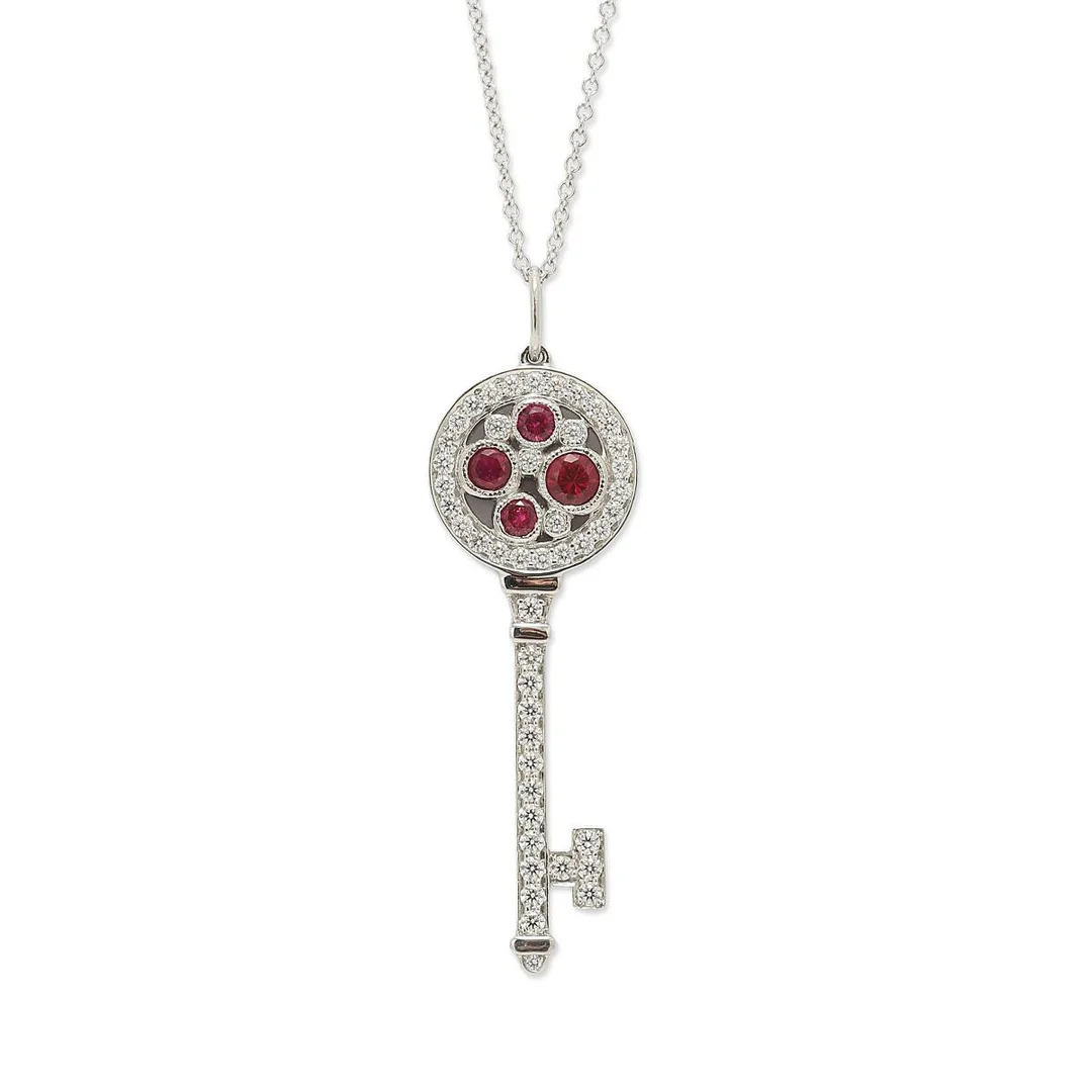 A “Cobblestone Key” pendant set with four circular-cut rubies and numerous brilliant-cut diamonds weighing a total of app. 0.53 ct, mounted in platinum. Colour: G-H. Clarity: VVS-VS. Accompanied by a necklace of 18k white gold. Weight in total app. 7 g. Pendant incl. eye-let L. 4.1 cm. L. 60 cm. (2) — Jewellery/Necklaces & pendants — Bruun Rasmussen
