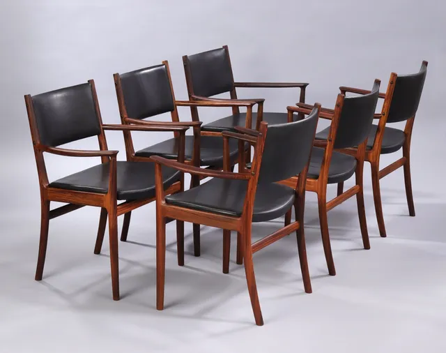 Kai Lyngfeldt Larsen. Six armchairs in rosewood, black leather (6)