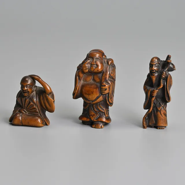 THREE JAPANESE CARVED BOXWOOD NETSUKE, UNSIGNED, MEIJI PERIDO.