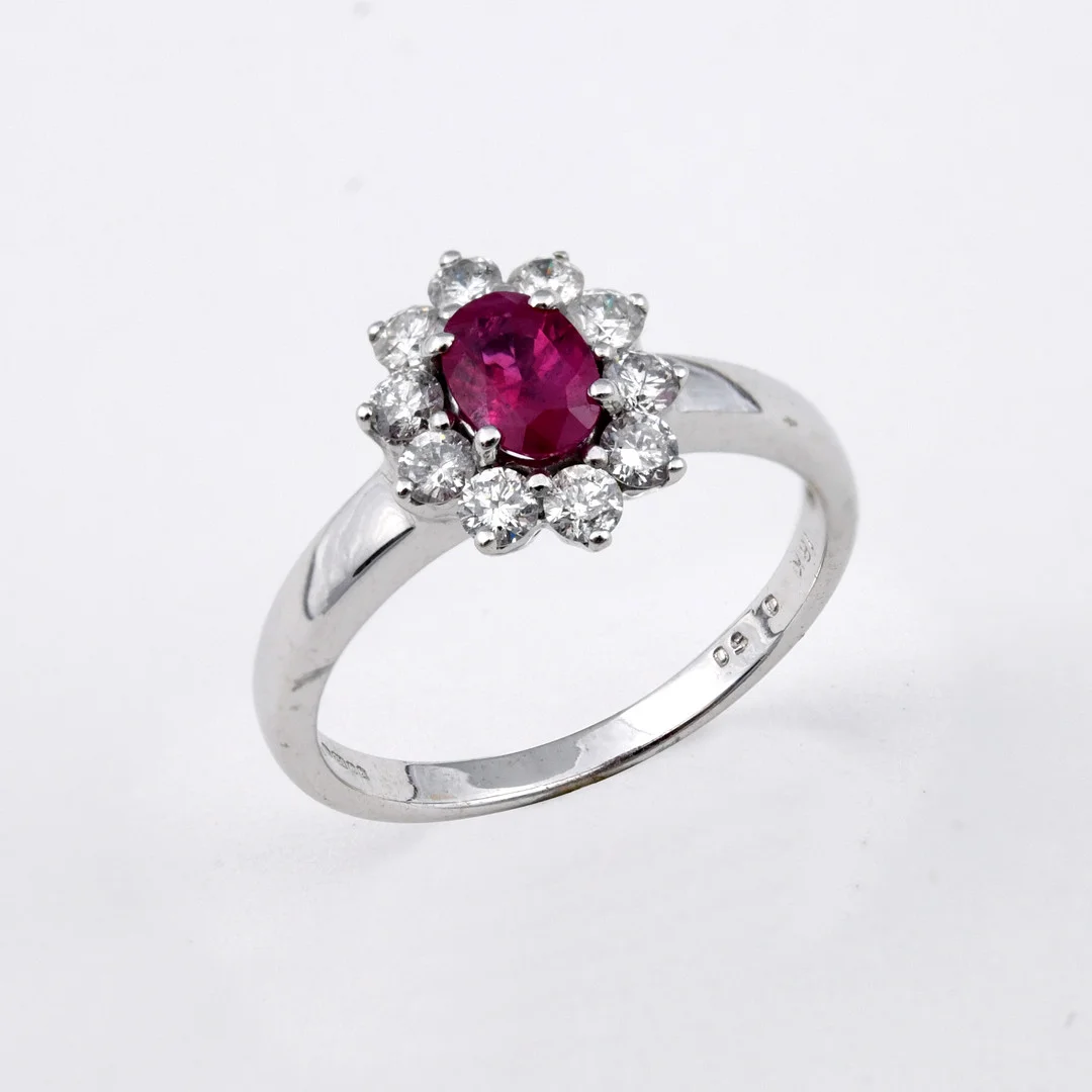 A RUBY AND DIAMOND CLUSTER RING. — Rings — Lawrences Auctioneers