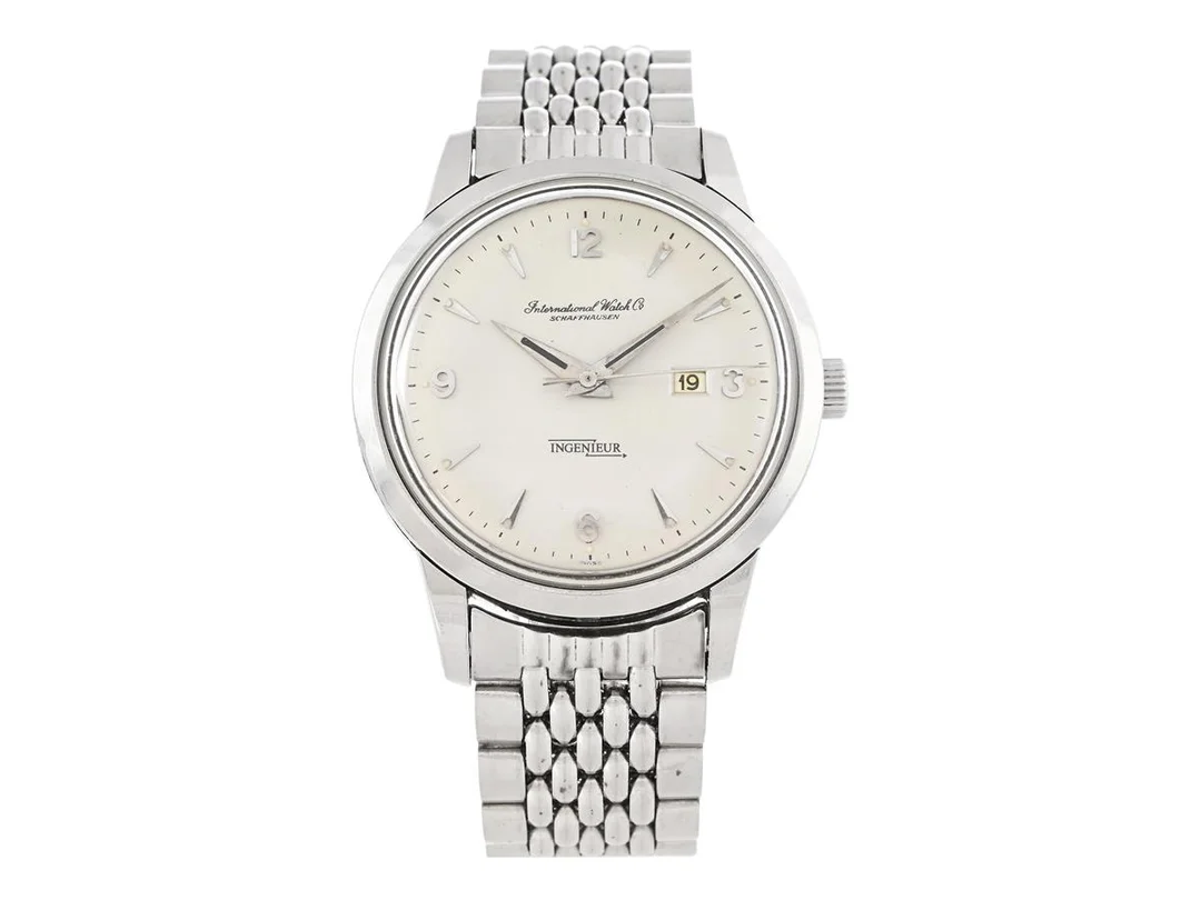 INTERNATIONAL WATCH Co. Schaffhausen, Ingenieur (Swiss), Cal 8521, Serie nr. 1351059, Ref nr. 666, Boett nr. 1375194, herrur, 36,5 mm, stål (Staybrite), automatisk, plexiglas, datum, renoverad urtavla, innerboett, originallänk (Gay Frères), viklås, Ref nr. 2-70/IA ca 1955. — Klockor/IWC — Kaplans