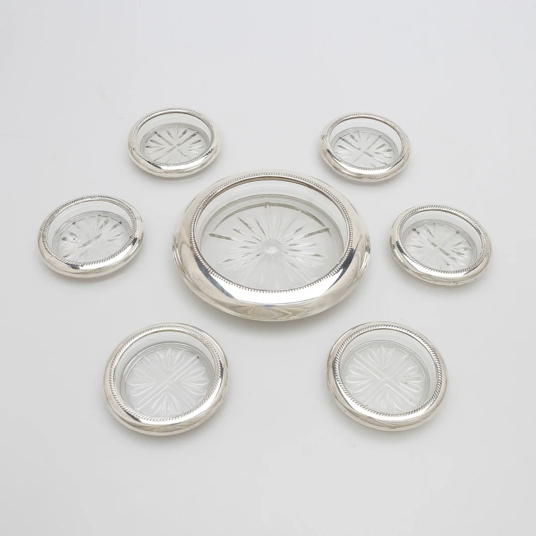 CHAMPAGNECOASTER SAMT SEX GLASCOASTERS. — Silver — Crafoord Auktioner Lund