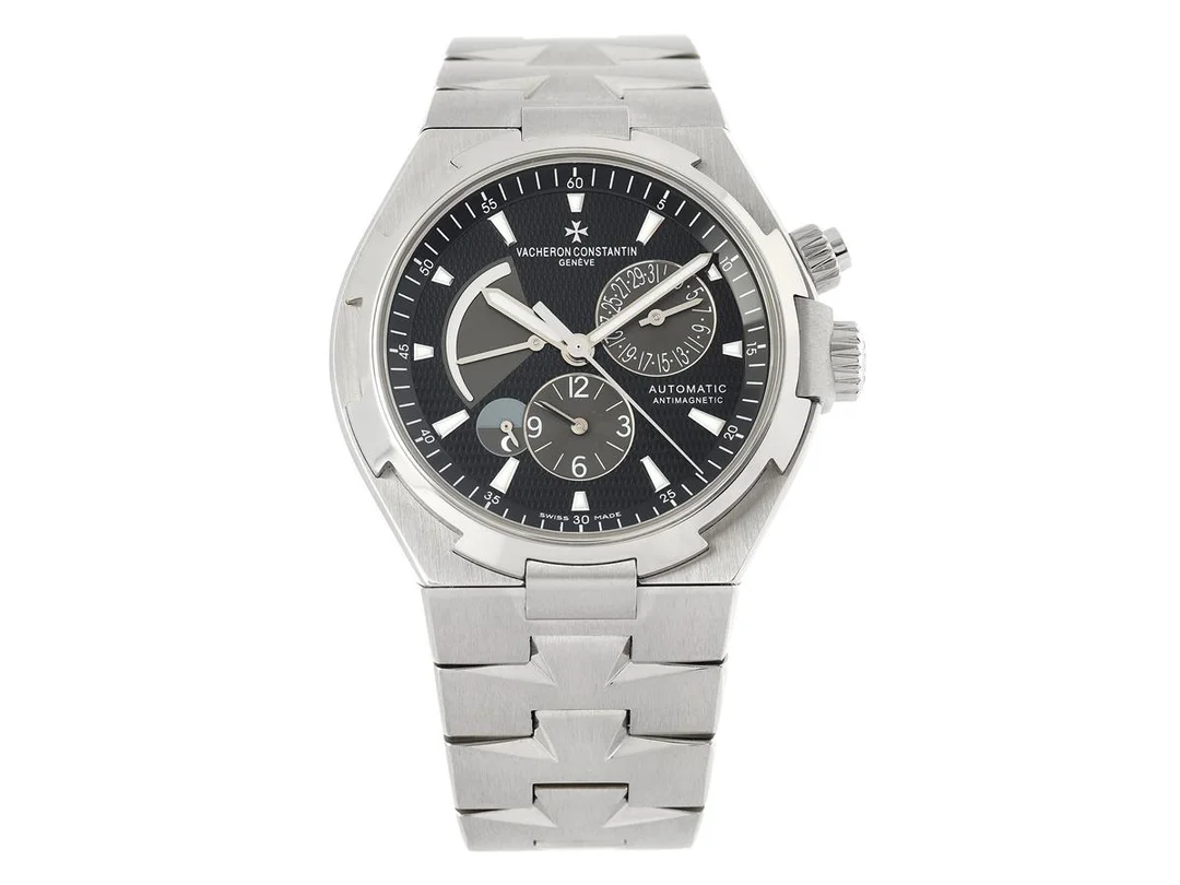 VACHERON CONSTANTIN, Genève, Overseas Dual Time "Antimagnetic", Cal 1222, Verk nr. 5156020, Ref nr. 47450/B01A-9227, Boett nr. 1157798, herrur, 42 mm, stål, automatisk, safirglas, datum, två tidszoner (GMT), gångreservsindikator, dag/natt indikator, integrerad originallänk, viklås, Ref nr. 3004/PBNE, längd 185 mm, servad juli 2021, cert, november 2009, box. — Klockor/Vacheron Constantin — Kaplans