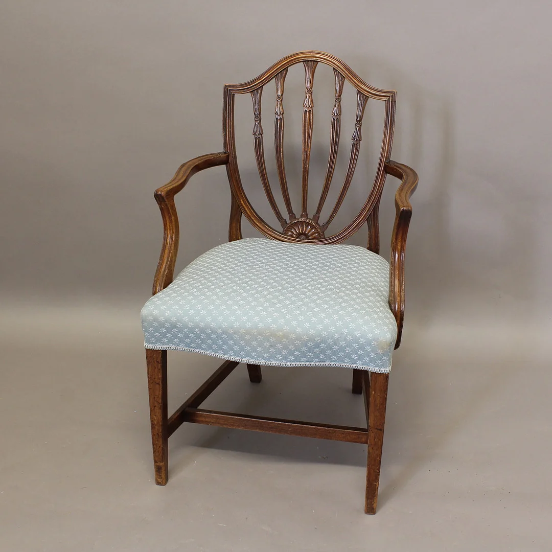 A CARVED MAHOGANY ELBOW CHAIR. — Armchairs & Chairs — Lawrences Auctioneers