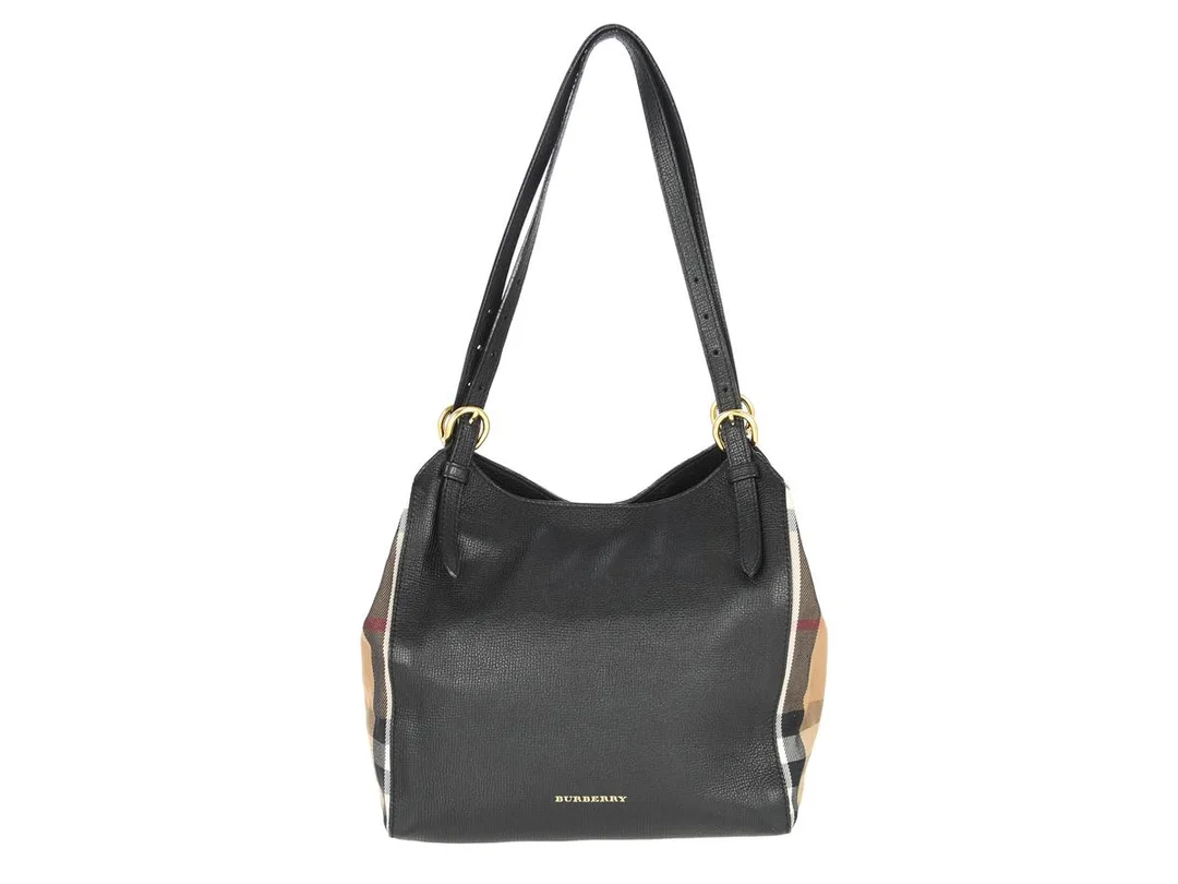 VÄSKA, BURBERRY, svart läder, rutigt tyg, 26x24x11 cm, dustbag. — Accessoarer/Väskor — Kaplans