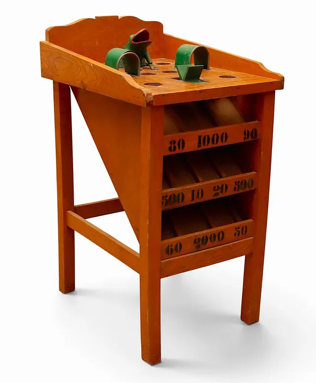 Juego de la rana en haya y hierro pintado, probablemente de Jorelle, de mediados del siglo XX.