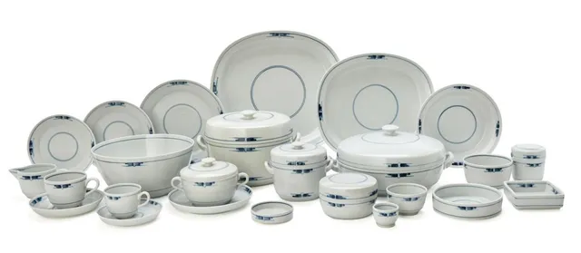 “Gemina”. Porcelain dinnerware and coffee service. Decorated with blue glazed decor and transparent glaze. Marked monogram. Made by Royal Copenhagen. (78)