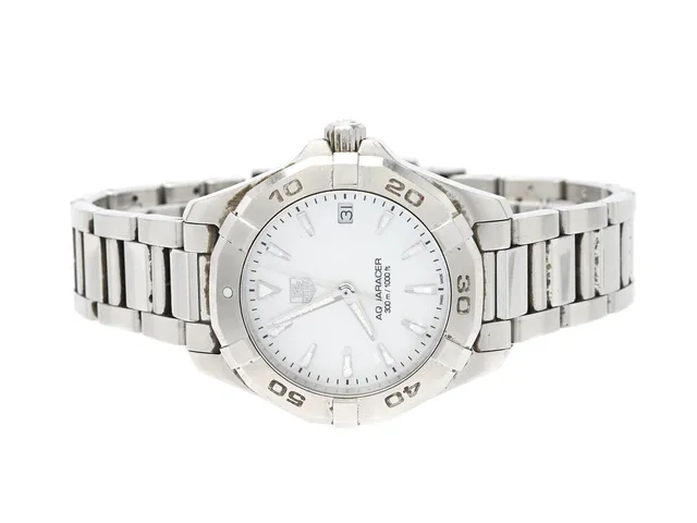 TAG HEUER, Aquaracer (300 m /1000 ft), Serie nr. RMT7082, Ref nr. WAY1312.BA0915, Boett nr. WAY1312, damur, 32 mm, stål, quartz, safirglas, datum, pärlemorurtavla (skadad), originallänk, viklås, Ref nr. FAA072/Y-F9/3189, ca 2012, box, ytterkartong.