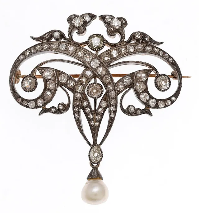 Belle Époque diamonds and pearl brooch-pendant, circa 1910.
