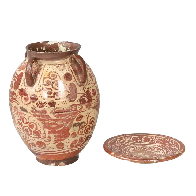 AN HISPANO-MORESQUE OVAL POTTERY VESSEL AND A DISH (2).