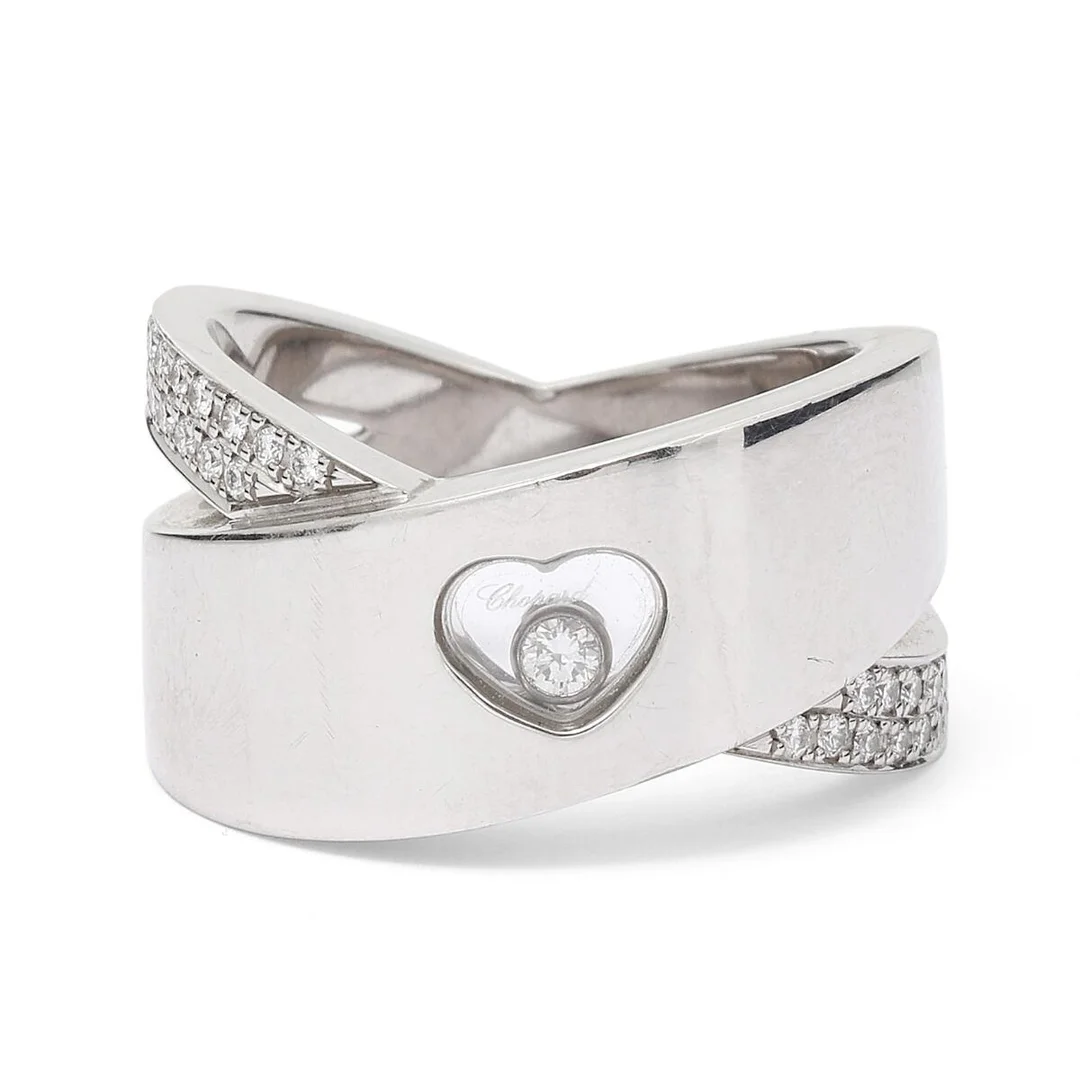 A diamond ring set with a movable brilliant-cut diamond weighing app. 0.05 ct. and numerous brilliant-cut diamonds weighing a total of app. 0.30 ct., mounted in 18k white gold. Serial no. 2908853. Weight app. 16 g. W. 11 mm. Size 54. — Jewellery/Rings — Bruun Rasmussen