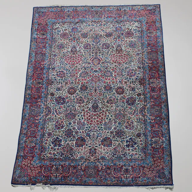 A ROOM SIZE KIRMAN CARPET, SOUTH EAST PERSIA.