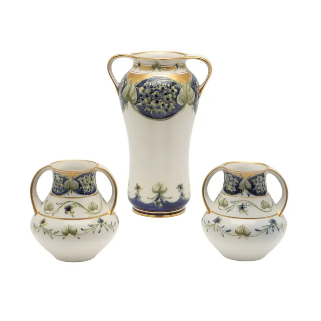 WILLIAM MOORCROFT - MACINTYRE FLORIAN VASE & PAIR OF VASES - LILAC.