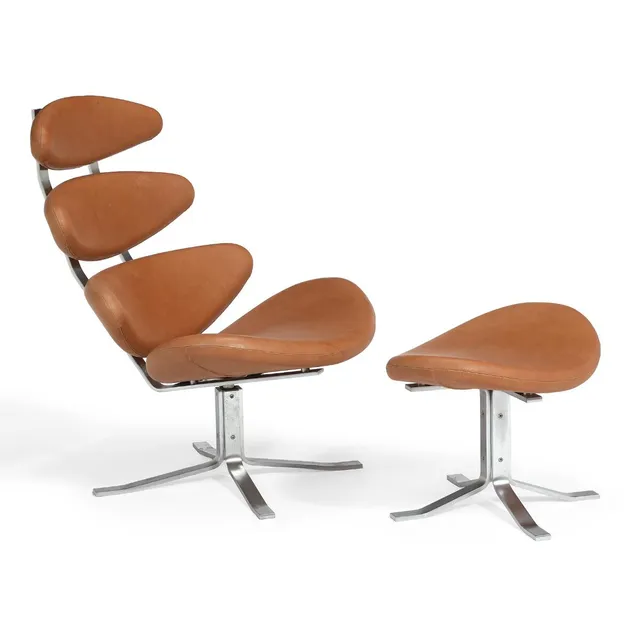 “Corona”. Lounge chair with mat chromed steel frame and matching stool. Seat and back upholstered with brown leather. Model EJ 5 and EJ 5-F. Designed 1964. Manufactured and marked by Erik Jørgensen. (2)