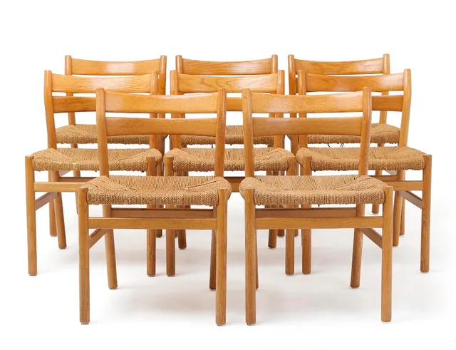 “BM 1”. Set of eight oak chairs with woven cane seats. Designed in 1958. Marked and manufactured by C.M. Madsen, Haarby. (8)