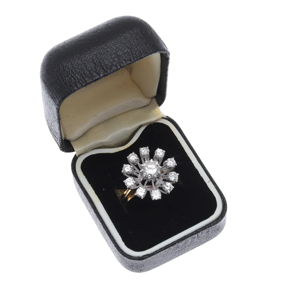 A DIAMOND AND 18CT GOLD CLUSTER RING. — Rings — Lawrences Auctioneers