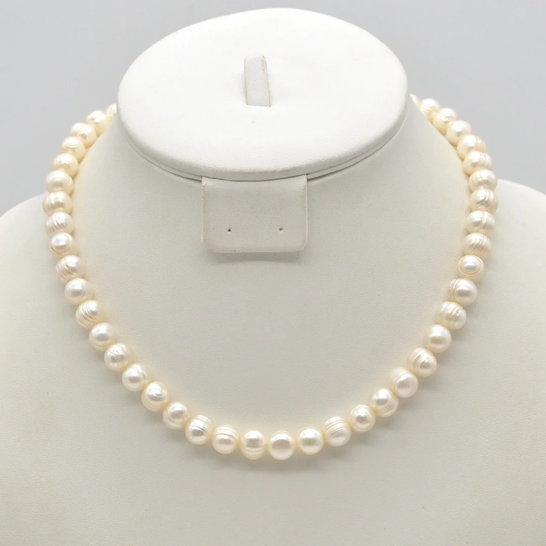 PERLENCOLLIER, SÜSSWASSERZUCHTPERLEN, WEISSER LÜSTER, ENTRUNDETE FORM, 20. JAHRHUNDERT. — Necklace — Kunst- und Auktionshaus Kleinhenz
