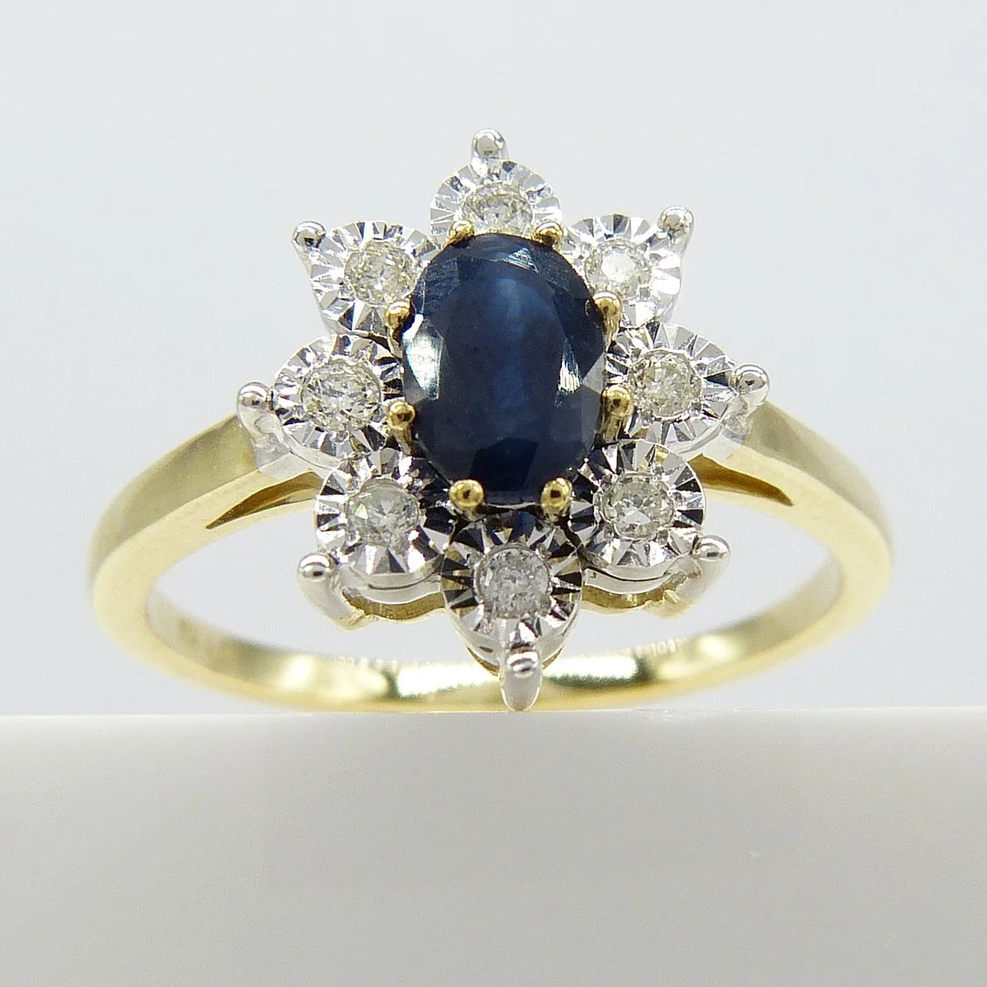 SAPPHIRE & DIAMOND CLUSTER RING. — Rings — Rumsey’s Auctioneers