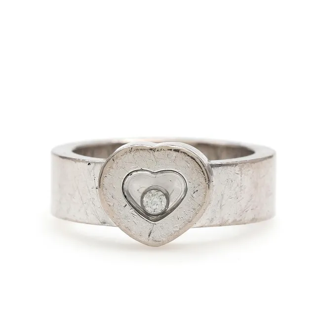 A “Happy Diamond” diamond ring set with a brilliant-cut diamond, mounted in 18k white gold. Weight app. 13.5 g. Size 52.