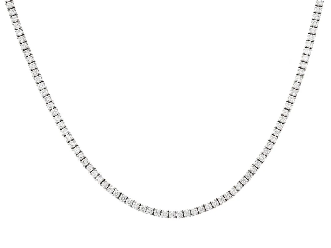 RIVIERECOLLIER, 18K vitguld, 177 briljantslipade diamanter ca 7,12 ctv, ca R-W/VS-SI, längd 42 cm, vikt 24,9 g. — Smycken/Collier — Kaplans