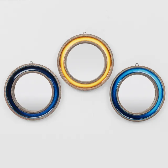 ERIK REIFF (1923-2006). Set of three round wall mirrors, partially glazed stoneware with fluted edges, Knabstrup, Denmark, 1950s/60s, (3).
