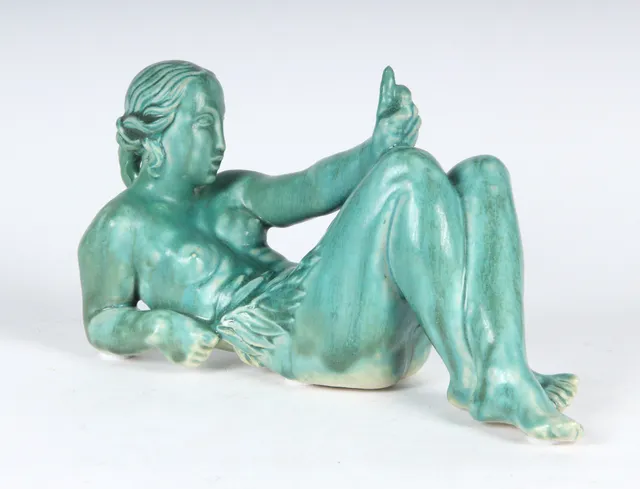 Jens Jacob Bregnø. Reclining nude woman with branch, green-glazed stoneware figurine, circa 1930s