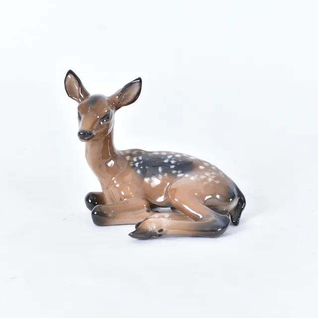 FRITZ HEIDENREICH. figurin, porslin, Rosenthal, liggande kid.