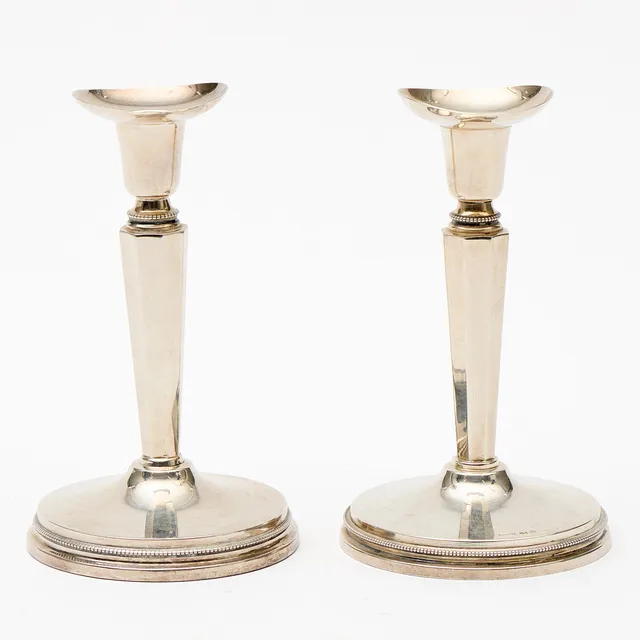 LJUSSTAKAR, ett par, Eric Löfman, silver, MGAB, Uppsala, 1963 och 1964.
