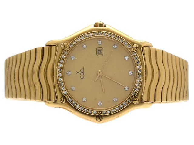 EBEL, Sport Classic, Ref nr. 883905, Serie nr. 130, herrur, 18K guld, quartz, safirglas, datum, diamanturtavla, briljantkrans, integrerad länk, cert, februari 1987, box