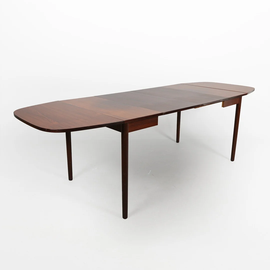 Dansk design. Spisebord af palisander med udtræk og klapper, 1960'erne (3). — Dining tables — Bidstrup Auktioner