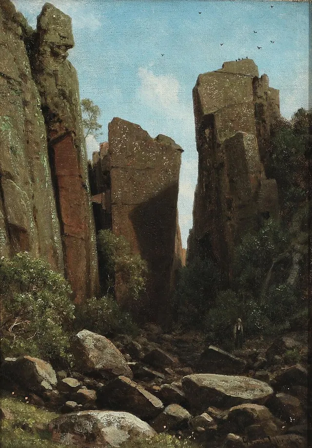 Georg Emil Libert: A view through a canyon. Signed and dated G. Emil Libert 87. Oil on canvas. 26×19 cm.