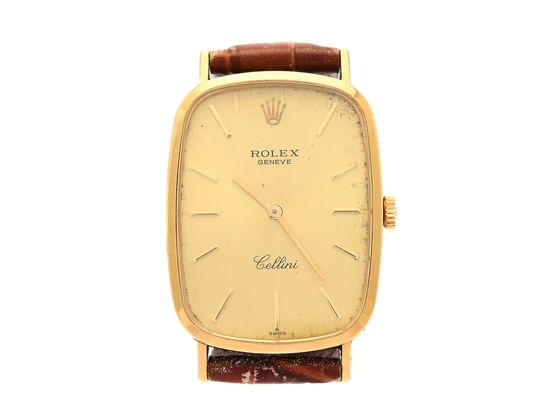 ROLEX, Genève, Cellini, Ref nr. 4113, Serie nr. 4354913, Cal 1601, Boett nr. 4113 77 / 253, herrur, 26 x 34 (40,5) mm, 18K guld, manuell, safirglas, skadad urtavla, läderband, originalspänne i doublé (skadad), ca 1976, box (skadad). — Klockor/Rolex — Kaplans