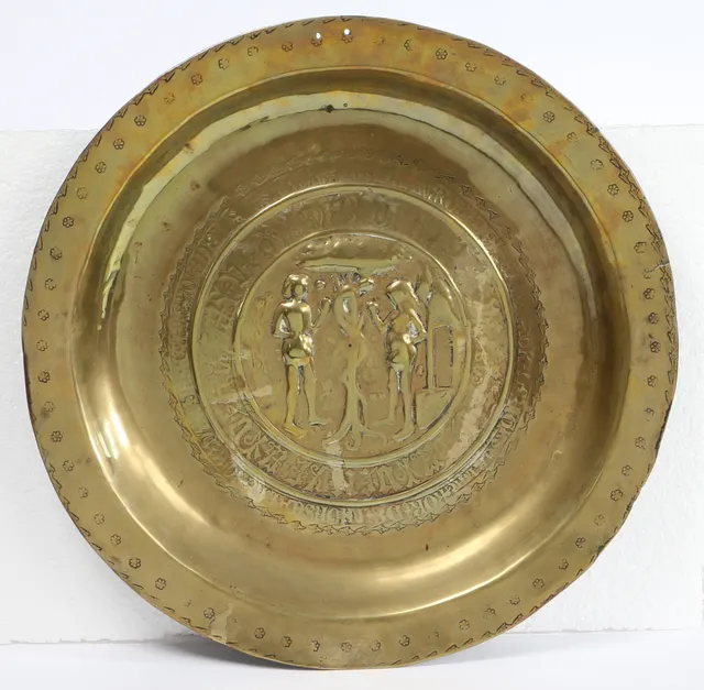 A RARE 16TH CENTURY BRASS ALMS DISH, NUREMBERG, CIRCA 1500-50.
