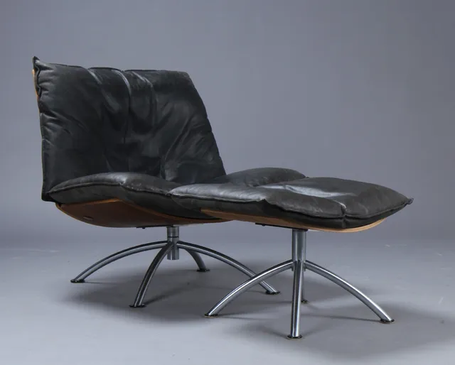 Tom Stepp. Large armchair with stool, walnut and aniline leather. Additional frame included (2)