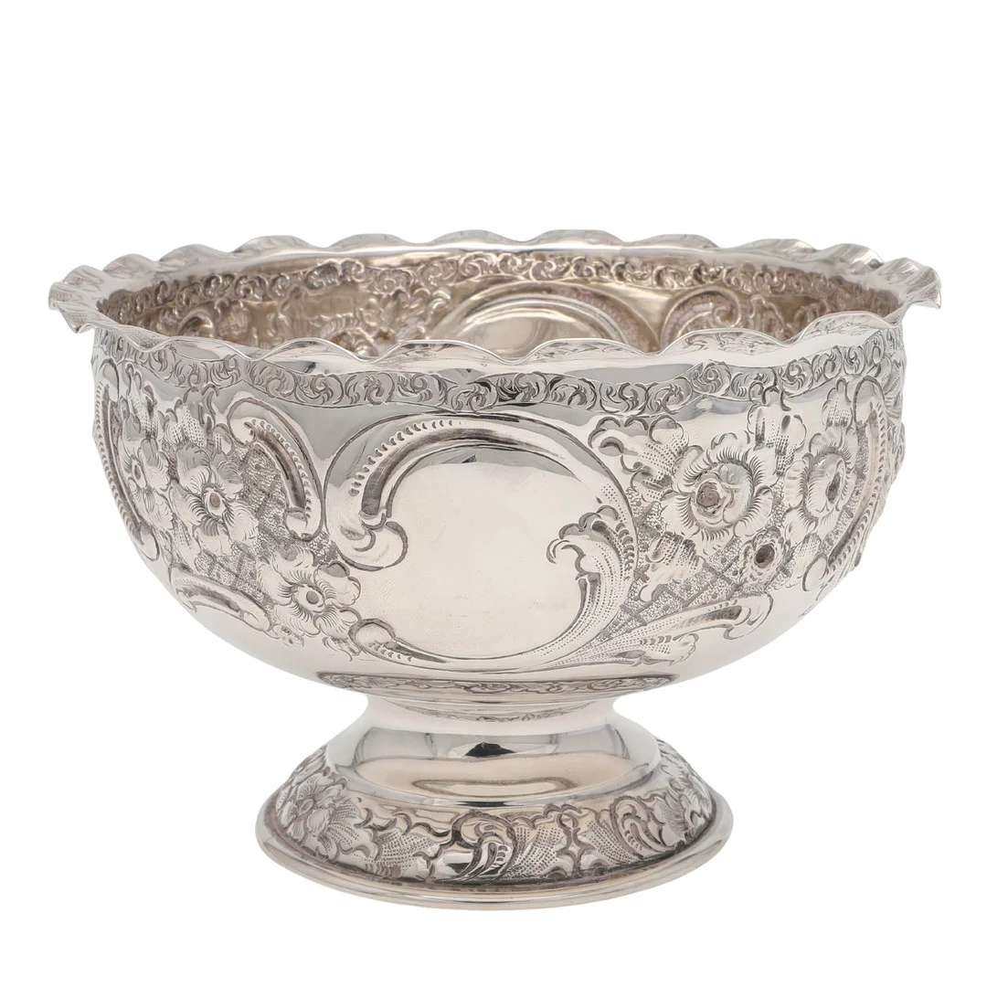 A LATE VICTORIAN EMBOSSED SILVER ROSE BOWL. — Silver — Lawrences Auctioneers