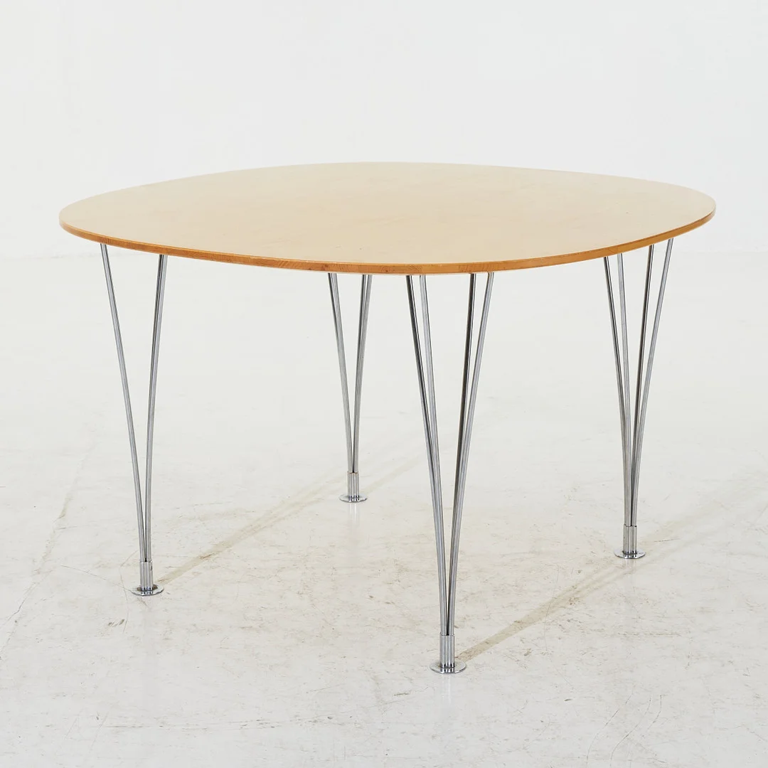 BRUNO MATHSSON / PIET HEIN. Matbord, "Supercirkel", för Bruno Mathsson International,, björkfaner med kromade spännben. — Tables — Stockholms Auktionsverk Magasin 5