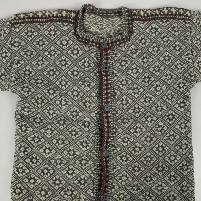 KOFTA, handstickad ull, 1900-talets senare del.