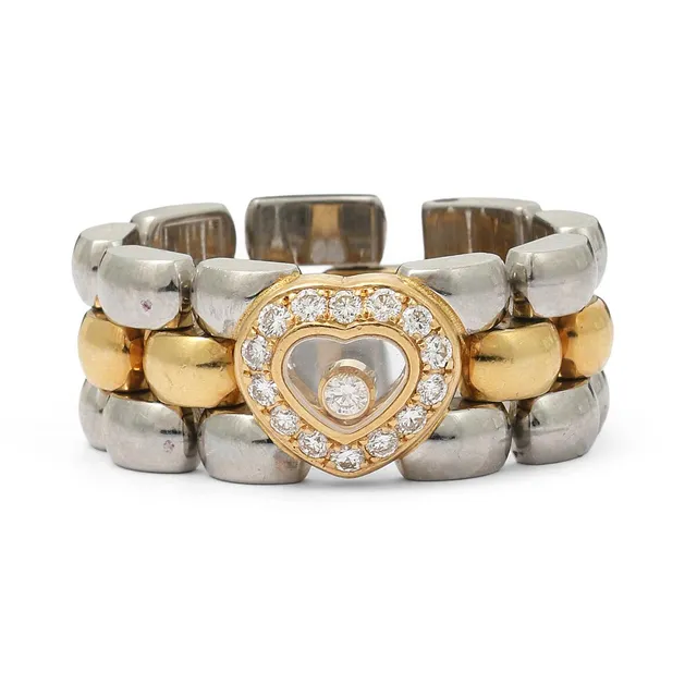 Happy diamond ring set with numerous diamonds, mounted in 18k gold and metal. Weight app. 14 g. W. 10 mm. Size 61.