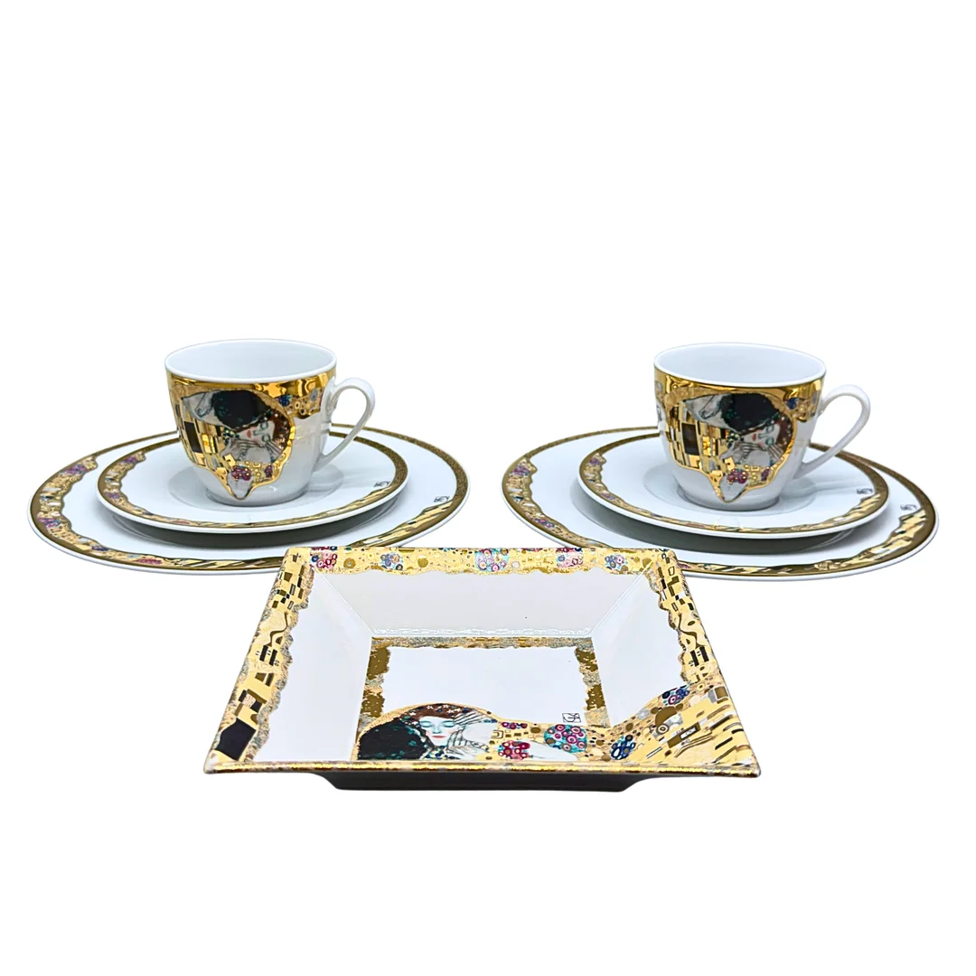 BRADFORD EDITIONS PORZELLANSET MOTIV "DER KUSS". — Tableware — Auktionshaus Stuber's Hammerschlag