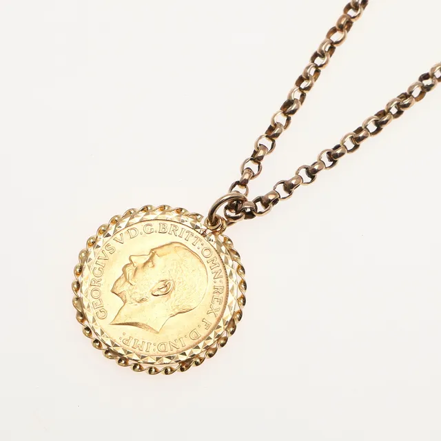 A GEORGE V GOLD SOVEREIGN.