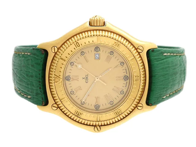 EBEL, Discovery Divers 200m, Cal 83, Serie nr. 407, Ref nr. 883913, herrur, 38 mm, 18K guld, quartz, safirglas, datum, utbytta visare (Luminova), integrerat läderband, viklås i 18K guld, cert, juli 1988, påse.