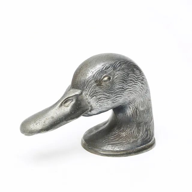 KAPSYLÖPPNARE, Ducky, Paris, vitmetall, 1900-tal.
