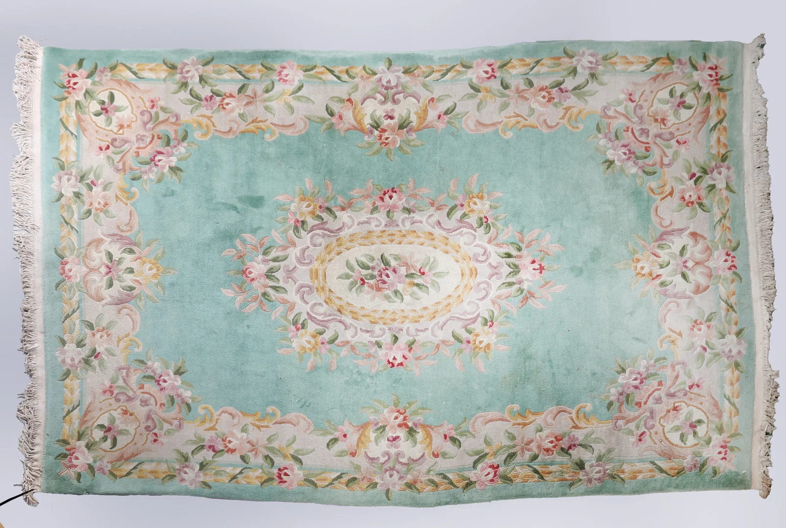 A FOLIATE DECORATED CARPET. — European Carpets & Textiles — Bishop & Miller