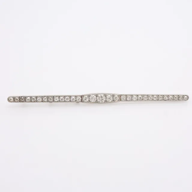 BROSCH, PLATINA & 31 ST GAMMALSLIPADE DIAMANTER OM TOTALT CIRKA 2 CT, 1920-TAL, SAMMANLAGT 7,9 GRAM.