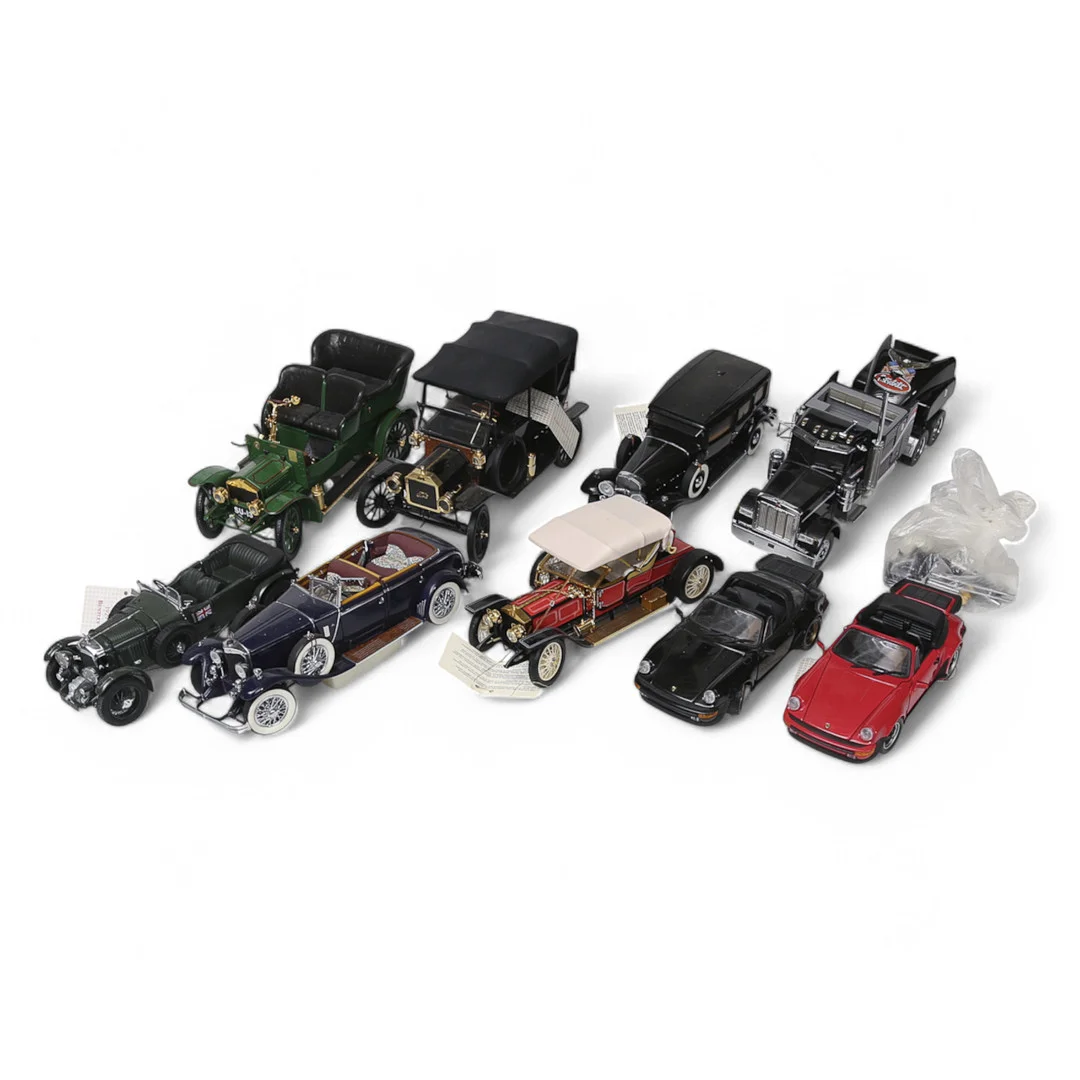 FRANKLIN MINT, 9 st., bilmodeller från Rolls Royce, Ford, Bentley, Mercedes, Cadillac, Porsche, Peterbilt. — Model cars — Limhamns Auktionsbyrå