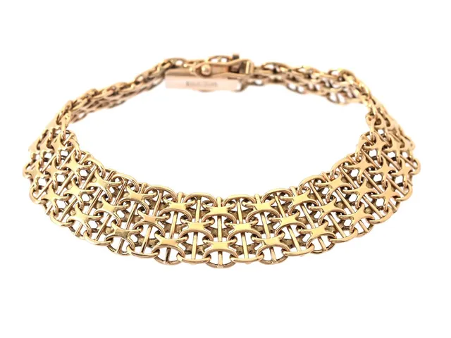 ARMBAND, 18K guld, X-länk med stav, bredd 11 mm, längd 17,5 cm, vikt 18,9 g.