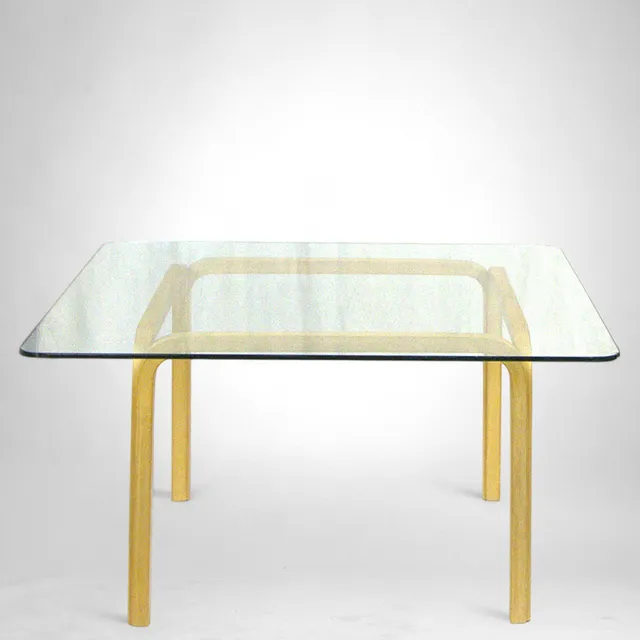 ALVAR AALTO. Soffbord med glasskiva, benställning i björk, modell Y805, Artek, Finland.