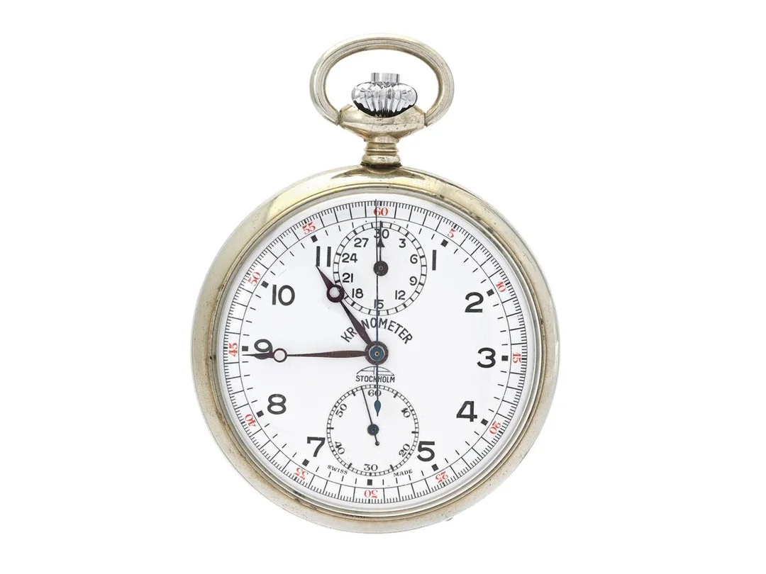 KRONOMETER STOCKHOLM, fickur, 51 mm, kronograf, Verk nr. 1888004, Boett nr. 425988, vitmetall, ankargång, ca 1970, etui. — Klockor/Kronometer Stockholm — Kaplans