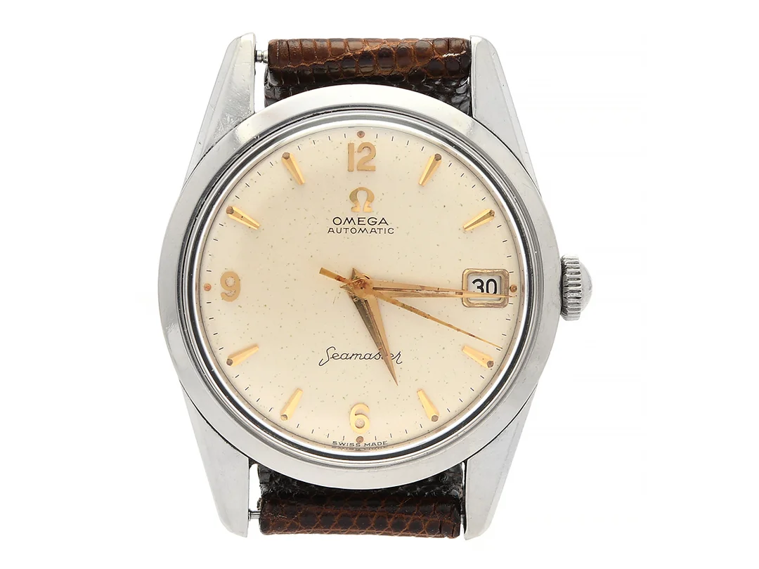 OMEGA, Seamaster, Cal 562, Serie nr. 18014040, Ref nr. CK 14701, Boett nr. 14701 2 SC (SGR), herrur, 33,5 mm, stål, automatisk, plexiglas, datum, skadad urtavla, läderband, ca 1961. — Klockor/Omega — Kaplans