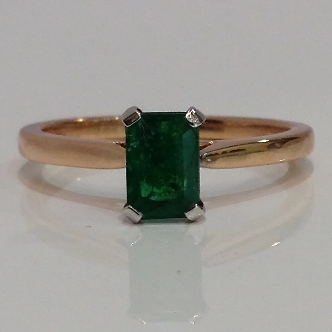 ROSE GOLD & EMERALD RING. — Rings — Rumsey’s Auctioneers